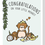 Voorkant geboortekaart met daarop een liaan en een aapje dat zit tussen de bananen en kokosnoten met de tekst 'Congratulations on your little monkey'