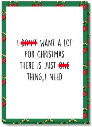 Mooie kerstwensen teksten kerstkaart met daarop de tekst "I don't (doorgestreept) want a lot for christmas there is just one(doorgestreept) things i need"